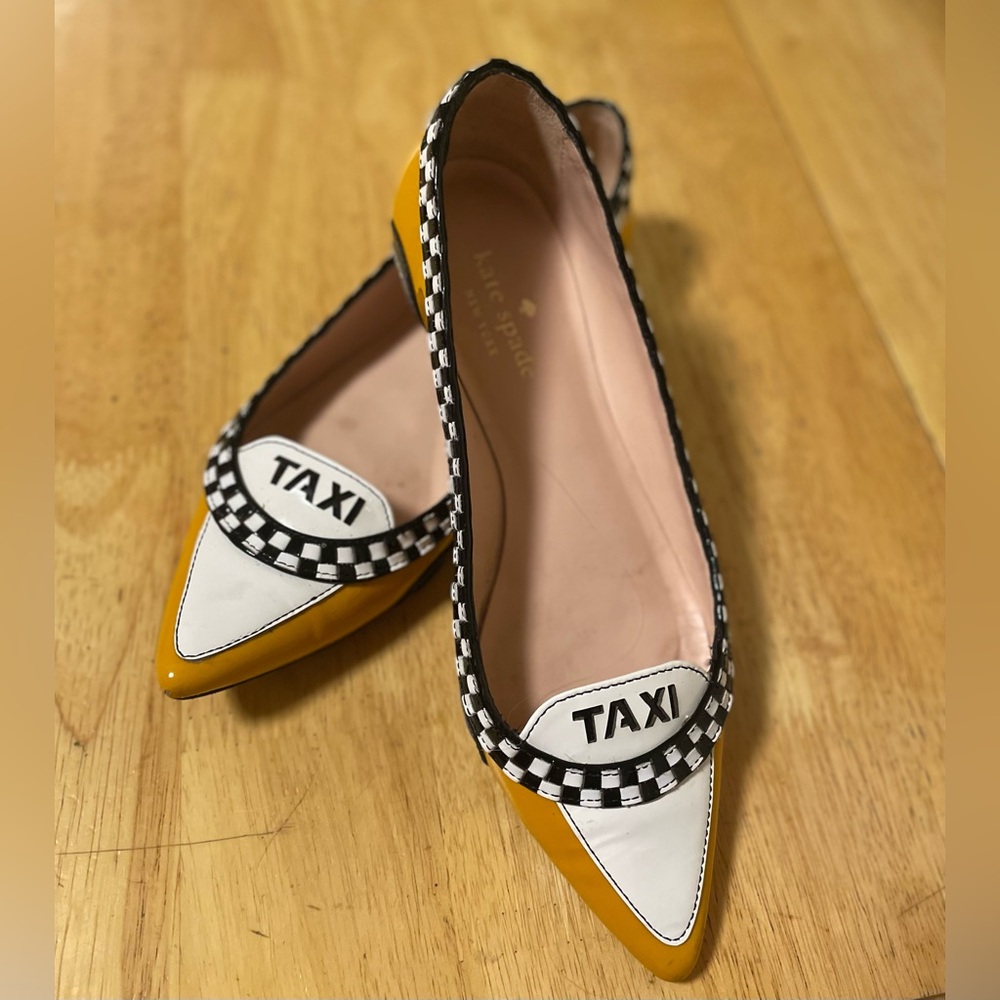 Kate Spade taxi size 6